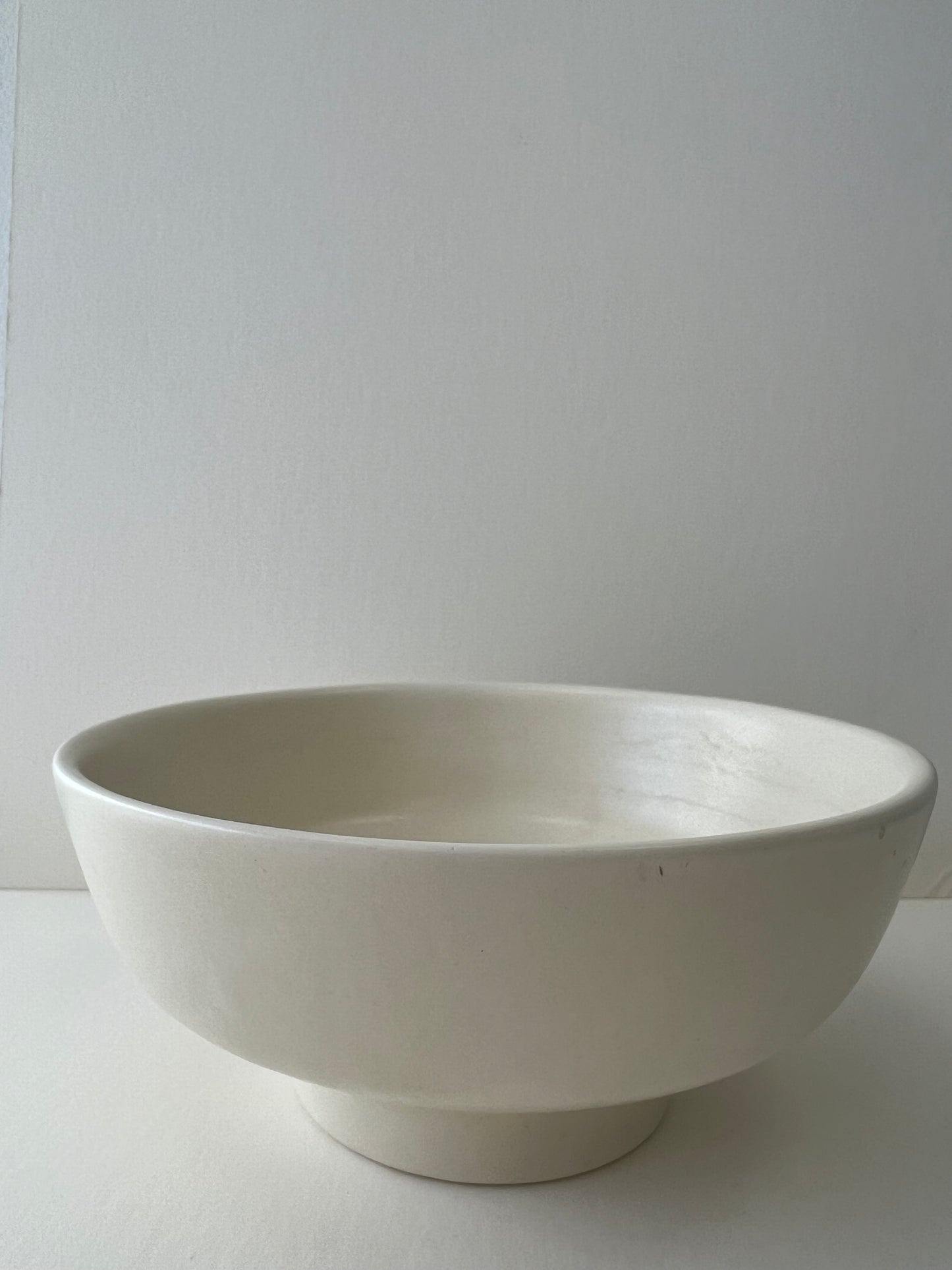 white ceramic haeger bowl