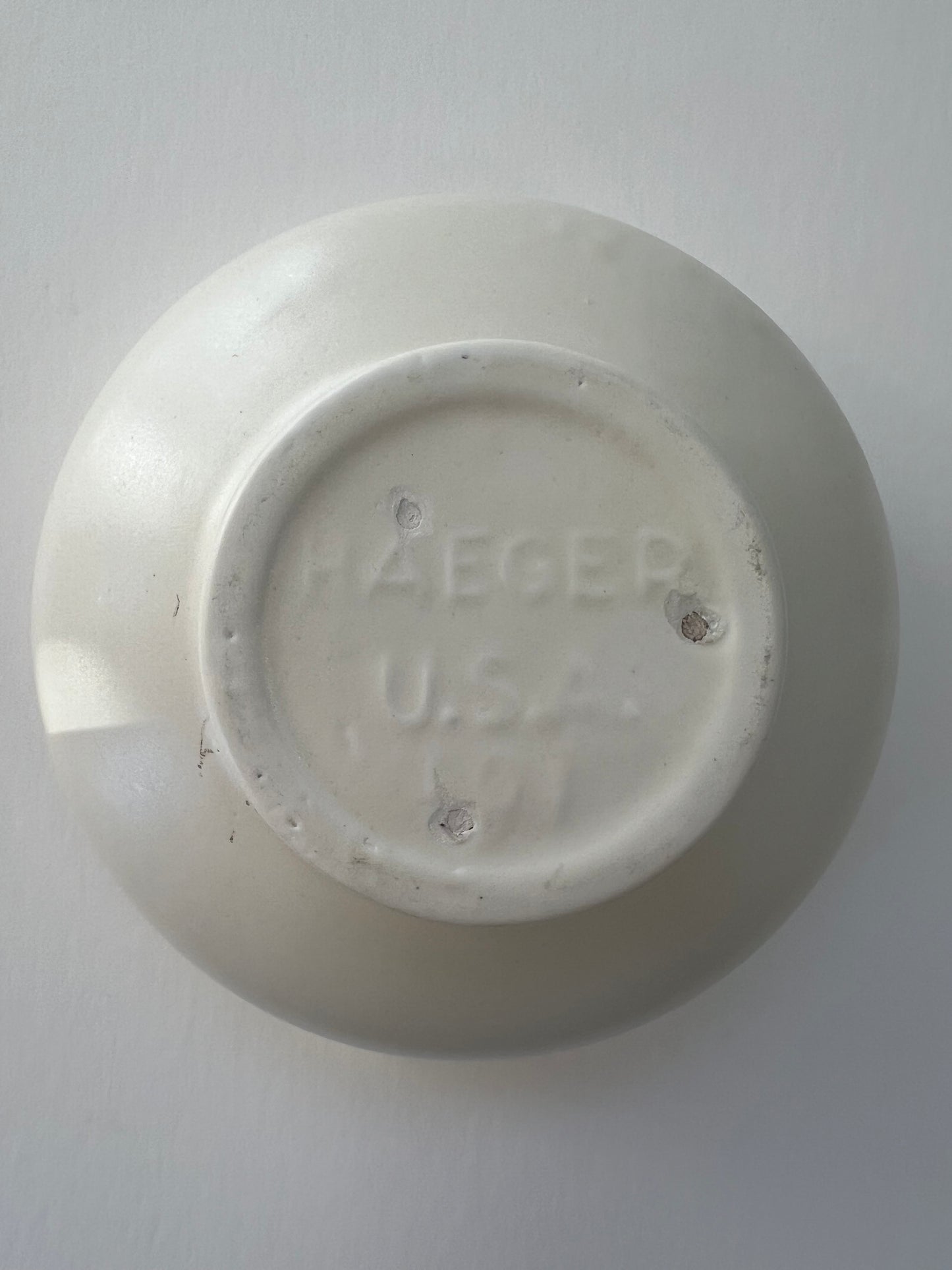 white ceramic haeger bowl