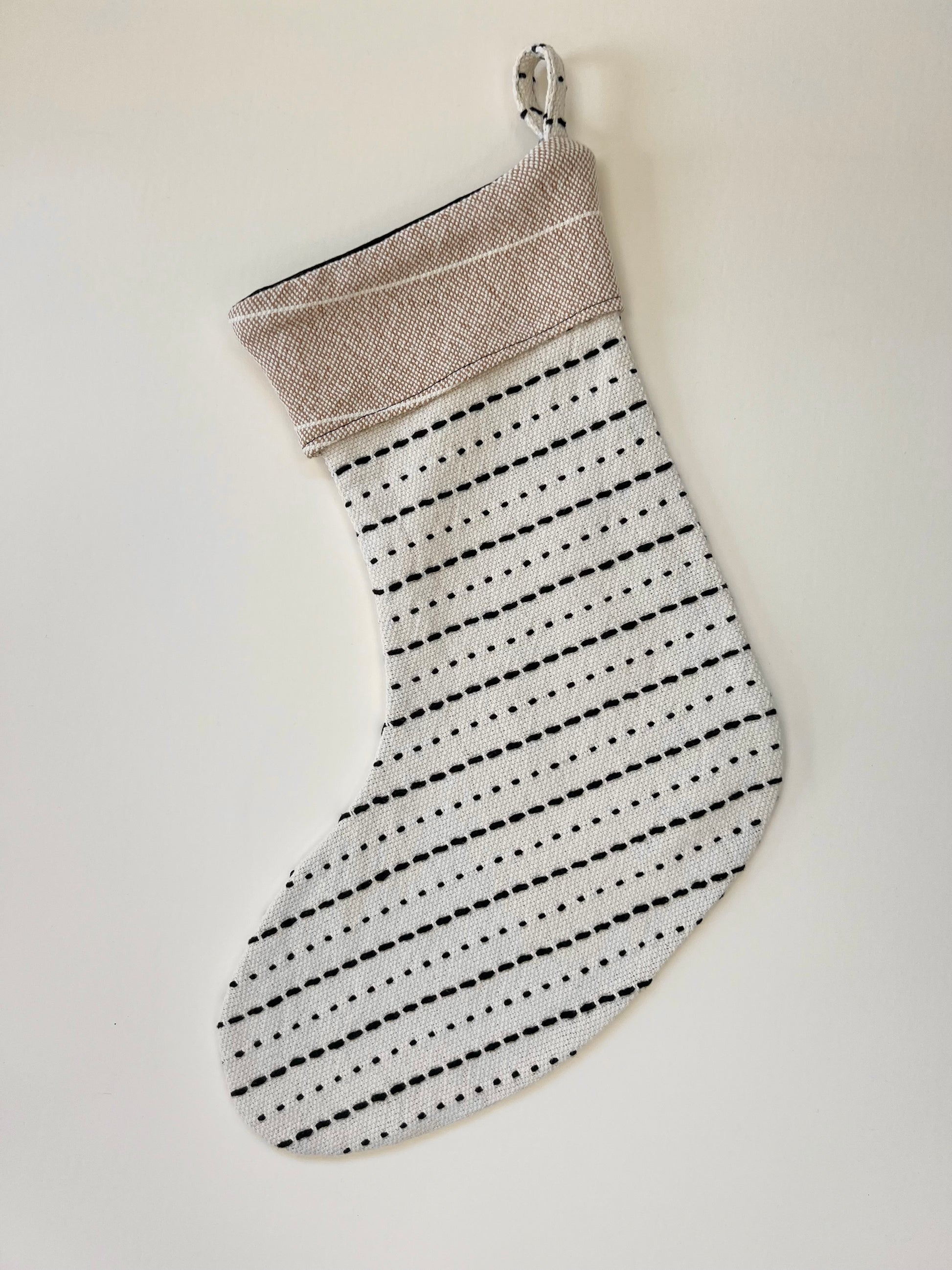 tan striped cuff 1, side b